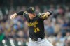 Pittsburgh Pirates pitcher Paul Skenes throws during the first inning of a baseball game against the Milwaukee Brewers, Friday, April 24, 2026, in Milwaukee. (AP Photo/Kayla Wolf)