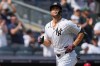 New York Yankees designated hitter Giancarlo Stanton (27) runs to home base after hitting a two-run home run during the third inning of a baseball game against the Los Angeles Angels, Thursday, April 16, 2026, in New York. (AP Photo/Yuki Iwamura)