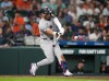 New York Yankees' José Caballero (72) hits a home run against Houston Astros relief pitcher Colton Gordon during the seventh inning of a baseball game, Friday, April 24, 2026, in Houston. (AP Photo/ Karen Warren)