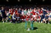 York City players and staff celebrate with the trophy after defeating Rochdale in the National League match in Rochdale, England, Saturday April 25, 2026. (Cody Froggatt/PA via AP)