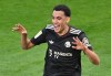 Bayern's Jamal Musiala celebrates after scoring his side's third goal during the Bundesliga soccer match between FSV Mainz 05 and FC Bayern Munich in Mainz, Germany, Saturday, April 25, 2026. (Torsten Silz/dpa via AP)