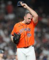 Houston Astros pitcher Colton Gordon reacts as he prepares to face New York Yankees' Ryan McMahon with the bases loaded during the sixth inning of a baseball game, Friday, April 24, 2026, in Houston. (AP Photo/Karen Warren)