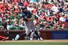 Seattle Mariners' Julio Rodríguez hits a two-run home run against the St. Louis Cardinals during the first inning of a baseball game, Saturday, April 25, 2026, in St. Louis. (AP Photo/Jeff Le)