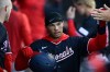 Washington Nationals' Daylen Lile celebrates with teammates in the dugout after scoring on a Nasim Nunez single during the fourth inning of a baseball game against the Chicago White Sox in Chicago, Saturday, April 25, 2026. (AP Photo/Paul Beaty)
