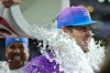 Kansas City Royals starting pitcher Cole Ragans is doused by Salvador Perez after their baseball game against the Los Angeles Angels, Saturday, April 25, 2026, in Kansas City, Mo. (AP Photo/Charlie Riedel)