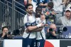 Vancouver Whitecaps' Brian White (left) celebrates his goal against the Colorado Rapids with Emmanuel Sabbi (11) during the first half of an MLS soccer match in Vancouver, on Saturday, April 25, 2026. THE CANADIAN PRESS/Ethan Cairns
