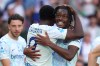 Inter Milan's Yann Aurel Bisseck, right, celebrates with teammate Marcus Thuram after scoring their sides's second goal ball during a Serie A soccer match between Torino and Inter Milan, in Turin, Italy, Sunday, April 26, 2026. (Spada/LaPresse via AP)