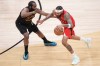 Toronto Raptors forward Brandon Ingram (3) tries to get around Cleveland Cavaliers guard James Harden (1) during second half NBA playoff basketball action in Toronto on Sunday, April 26, 2026. THE CANADIAN PRESS/Nathan Denette