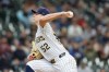 Milwaukee Brewers pitcher Kyle Harrison (52) throws during the first inning of a baseball game against the Pittsburgh Pirates Sunday, April 26, 2026, in Milwaukee. (AP Photo/Jeffrey Phelps)