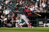 Washington Nationals' José Tena hits a solo home run during the 10th inning of a baseball game against the Chicago White Sox in Chicago, Sunday, April 26, 2026. (AP Photo/Nam Y. Huh)