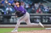 Colorado Rockies pitcher Chase Dollander throws during the third inning of the second baseball game of a doubleheader against the New York Mets, Sunday, April 26, 2026, in New York. (AP Photo/Seth Wenig)