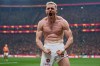 Galatasaray's Baris Yilmaz celebrates after scoring his side's second goal during a Turkish Super Lig soccer match between Galatasaray and Fenerbahce in Istanbul, Turkey, Sunday, April 26, 2026. (AP Photo/Khalil Hamra)