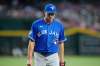Toronto Blue Jays starting pitcher Max Scherzer walks off the field after retiring the Arizona Diamondbacks during the sixth inning of a baseball game, Saturday, April 18, 2026, in Phoenix. (AP Photo/Ross D. Franklin)