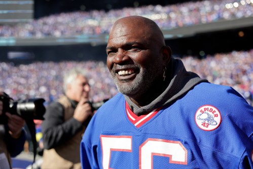 FILE - Former New York Giants Lawrence Taylor on the field before an NFL football game against the Indianapolis Colts on Jan. 1, 2023, in East Rutherford, N.J. (AP Photo/Adam Hunger, File)