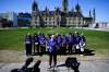 Founder and CEO of Children First Canada Sara Austin  speaks during a ‘Time Is Up: Children and Families Take Over Parliament Hill to Demand Online Safety’ rally on Parliament Hill in Ottawa, on Monday, April 27, 2026. THE CANADIAN PRESS/Spencer Colby
