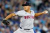 Boston Red Sox pitcher Ranger Suarez (55) works against the Blue Jays during a Major League Baseball game in Toronto on April 27, 2026. THE CANADIAN PRESS/Frank Gunn