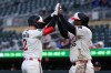 Minnesota Twins' Kody Clemens, left, celebrates after his three-run home run with Josh Bell during the third inning of a baseball game against the Seattle Mariners, Monday, April 27, 2026, in Minneapolis. (AP Photo/Matt Krohn)