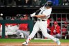 Chicago White Sox's Munetaka Murakami, of Japan, hits a single during the first inning of a baseball game against the Los Angeles Angels in Chicago, Monday, April 27, 2026. (AP Photo/Nam Y. Huh)