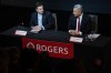 Rogers chair of the board Edward Rogers, left, talks with CEO Tony Staffieri at the telecommunications company's AGM, in Toronto, Wednesday, April 26, 2023. THE CANADIAN PRESS/Chris Young