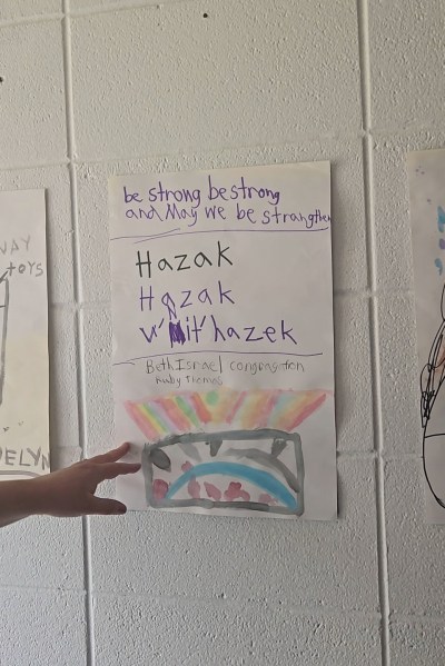 Children's drawings are taped up in Beth Israel Congregation on Sunday, April 26, 2026, in Jackson, Miss. (Molly Minta/Mississippi Today via AP)