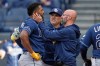 Tampa Bay Rays' Junior Caminero is checked out after being hit with a foul tip in the first inning of a baseball game against the Cleveland Guardians in Cleveland, Tuesday, April 28, 2026. (AP Photo/Sue Ogrocki)