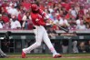 Cincinnati Reds' Elly de la Cruz hits a single during the first inning of a baseball game against the Colorado Rockies', Tuesday, April 28, 2026, in Cincinnati. (AP Photo/Kareem Elgazzar)