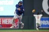 Seattle Mariners' J.P. Crawford advances to third base on a double hit by Julio Rodríguez during the eighth inning of a baseball game against the Minnesota Twins, Tuesday, April 28, 2026, in Minneapolis. (AP Photo/Matt Krohn)