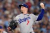 FILE - Los Angeles Dodgers pitcher Blake Snell throws against the Toronto Blue Jays during the eighth inning in Game 7 of baseball's World Series, on Nov. 1, 2025, in Toronto. (AP Photo/Brynn Anderson, File)