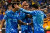 UANL Tigres forward Ángel Correa, right, celebrates his goal against Nashville SC with Francisco Reyes, second from right, and other team mates during the first half of an CONCACAF Champions Cup first leg semifinal soccer match Tuesday, April 28, 2026, in Nashville, Tenn. (AP Photo/John Amis)