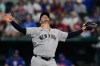 New York Yankees pitcher Fernando Cruz celebrates after working against the Texas Rangers in the eighth inning of a baseball game Tuesday, April 28, 2026, in Arlington, Texas. (AP Photo/Tony Gutierrez)