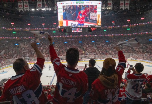 Fans cheer as the Montreal Canadiens take the ice for warm up prior to their NHL playoff hockey game against the Tampa Bay Lightning in Montreal on Sunday, April 26, 2026. THE CANADIAN PRESS/Christinne Muschi