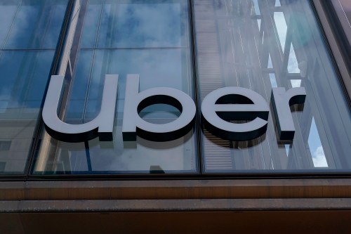 FILE - An Uber sign is displayed at the company's headquarters in San Francisco, Monday, Sept. 12, 2022. (AP Photo/Jeff Chiu, File)