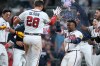 Atlanta Braves' Matt Olson (28) celebrates hitting a walk-off two run home run in the ninth inning of a baseball game against the Detroit Tigers Wednesday, April 29, 2026, in Atlanta. (AP Photo/Brynn Anderson)