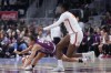 Tempo guard Maddison Rocci (9) is tripped up by Connecticut Sun counterpart Mamignan Toure (28) in Toronto on Wednesday, April 29, 2026. THE CANADIAN PRESS/Nathan Denette