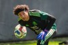FILE - Mexico's goalkeeper Guillermo Ochoa plays a ball during a training session ahead of a friendly soccer match against Portugal in Mexico City, Thursday, March 26, 2026. (AP Photo/Marco Ugarte, File)