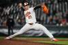 Baltimore Orioles pitcher Ryan Helsley (21) delivers during the ninth inning of a baseball game against the Houston Astros, Tuesday, April 28, 2026, in Baltimore. (AP Photo/Stephanie Scarbrough)