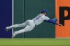 Texas Rangers right fielder Ezequiel Duran (20) catches a Detroit Tigers' Kerry Carpenter fly ball during the seventh inning of a baseball game Friday, May 1, 2026, in Detroit. (AP Photo/Paul Sancya)