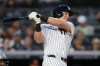 New York Yankees' Ben Rice follows through on a three-run home run during the second inning of a baseball game against the Baltimore Orioles Friday, May 1, 2026, in New York. (AP Photo/Frank Franklin II)