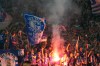 Schalke fans light flares during the German Bundesliga 2 soccer match between FC Schalke 04 and Fortuna Duesseldorf in Gelsenkirchen, Germany, Saturday, May 2, 2026. (AP Photo/Martin Meissner)
