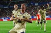 Barcelona's Robert Lewandowski celebrates after scoring his side's opening goal during a Spanish La Liga soccer match between Osasuna and Barcelona in Pamplona, Spain, Saturday, May 2, 2026. (AP Photo/Miguel Oses)