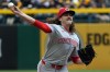 Cincinnati Reds pitcher Rhett Lowder delivers a pitch against the Pittsburgh Pirates in the first inning of a baseball game in Pittsburgh, Saturday, May 2, 2026. (AP Photo/Tom E. Puskar)