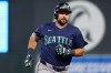 Seattle Mariners designated hitter Cal Raleigh runs the bases after hitting a two-run home run against the Minnesota Twins during the eighth inning of a baseball game, Monday, April 27, 2026, in Minneapolis. (AP Photo/Matt Krohn)