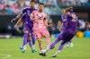 Inter Miami forward Lionel Messi (10) battles for the ball in the first half during an MLS soccer match against the Orlando City, Saturday, May 2, 2026, in Miami. (AP Photo/Chris Arjoon)