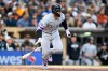 Chicago White Sox's Edgar Quero hits an RBI single during the seventh inning of a baseball game against the San Diego Padres Saturday, May 2, 2026, in San Diego. (AP Photo/Denis Poroy)