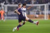 Los Angeles Galaxy midfielder Marco Reus, left, and Vancouver Whitecaps defender Mathias Laborda chase the ball during the first half of an MLS soccer match Saturday, May 2, 2026, in Carson, Calif. (AP Photo/Jae C. Hong)