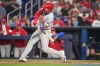 Philadelphia Phillies' Bryson Stott hits a three-run home run in the first inning of a baseball game against the Miami Marlins, Sunday, May 3, 2026, in Miami. (AP Photo/Jim Rassol)
