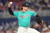 Miami Marlins pitcher Chris Paddack delivers during the first inning of a baseball game against the Philadelphia Phillies, Sunday, May 3, 2026, in Miami. (AP Photo/Jim Rassol)