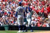 Los Angeles Dodgers' Max Muncy catches a fly ball for an out against St. Louis Cardinals' José Fermín while Justin Wrobleski watches during the sixth inning of a baseball game, Sunday, May 3, 2026, in St. Louis. (AP Photo/Scott Kane)
