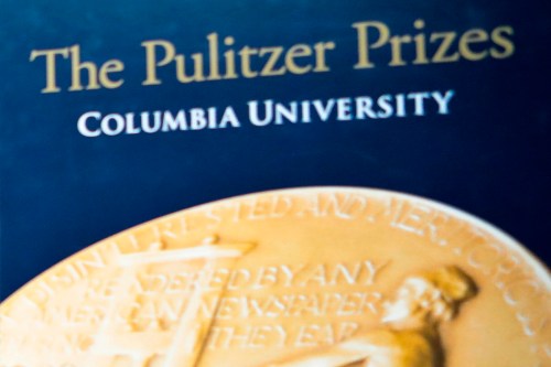FILE - Signage for The Pulitzer Prizes appear at Columbia University, May 28, 2019, in New York. (AP Photo/Bebeto Matthews, File)