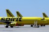 A line of Spirit Airlines jets sit on the tarmac at the Orlando International Airport on May 20, 2020, in Orlando, Fla. (AP Photo/Chris O'Meara, File)